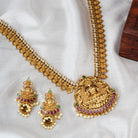 Exquisite Goddess Laxmi temple necklace set with matching earrings, perfect for festive wear.
