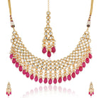 Elegant Kundan bridal choker set with intricate pearls, perfect for festive celebrations.
