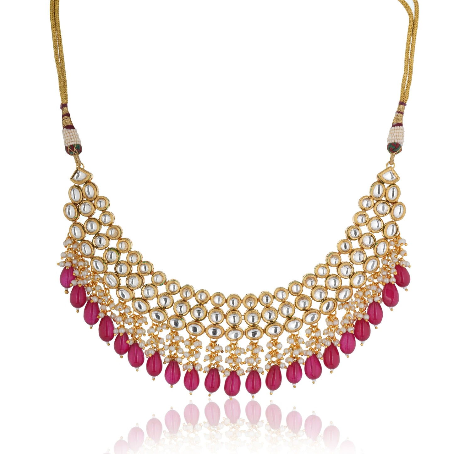 THIS STUNNING KUNDAN NECKLACE SET, FEATURING EXQUISITE CRAFTSMANSHIP AND INTRICATELY EMBEDDED PEARLS.