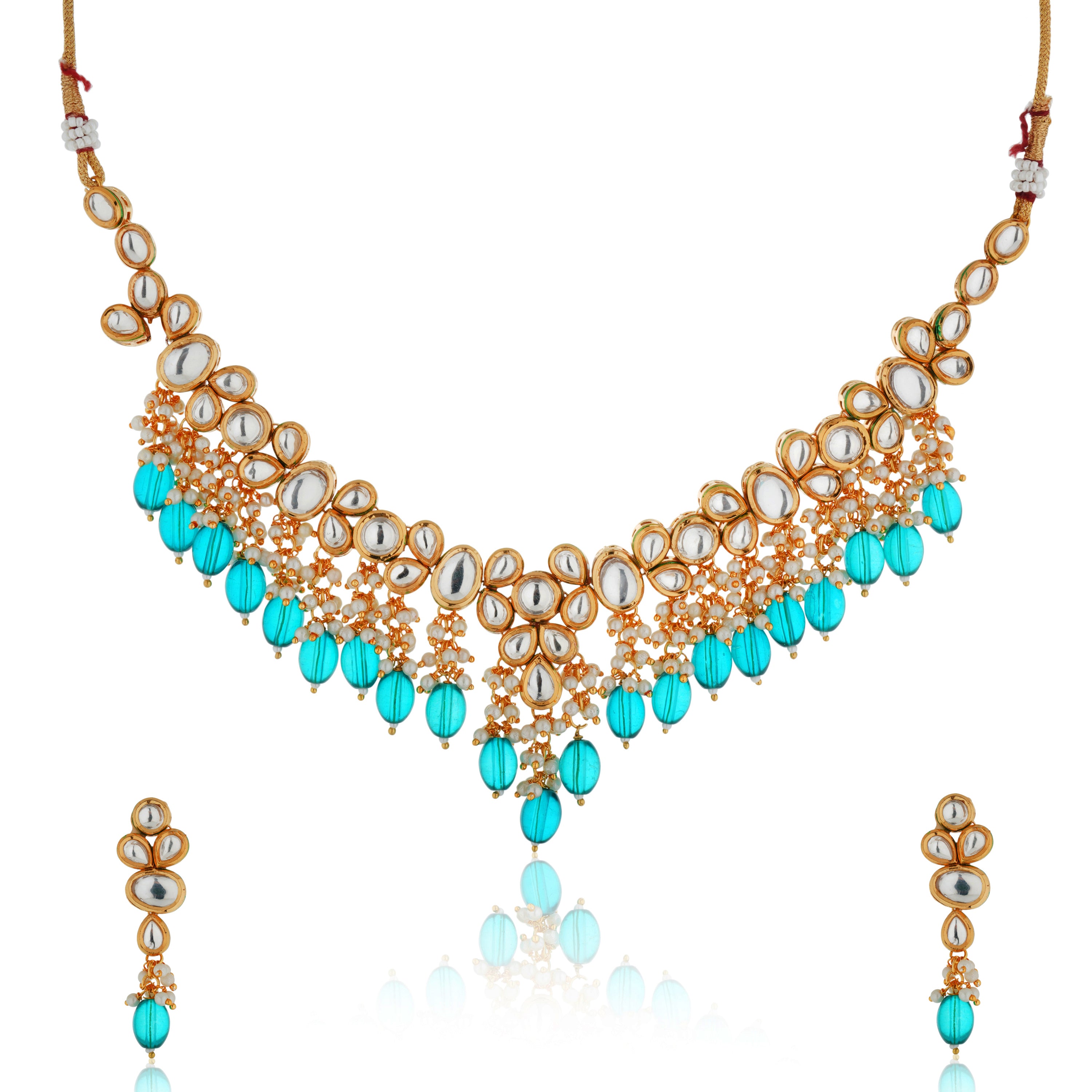 Festive Kundan necklace set with teal and white pearls, offering a vibrant and elegant touch.
