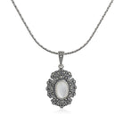 Elegant 925 silver pendant set with lustrous pearls and matching earrings for a sophisticated look.
