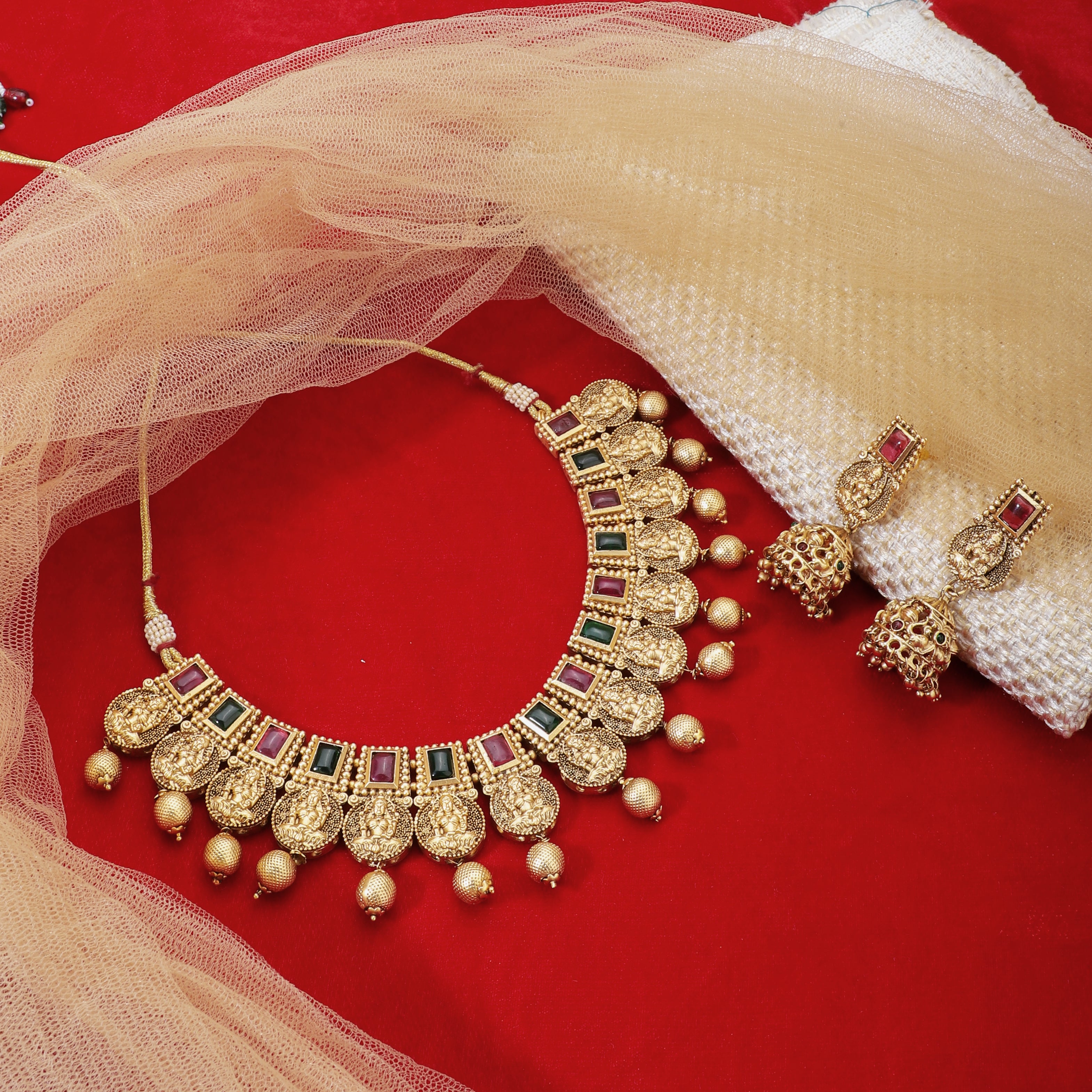 Exquisite Goddess Laxmi crafted temple necklace set with intricate design for festive occasions.
