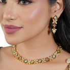 Stunning multicolor Zircon-studded necklace set with matching earrings for a festive look.
