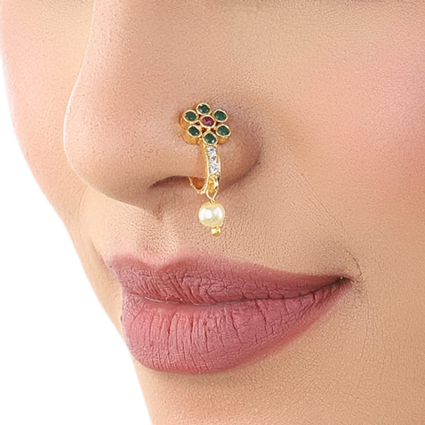 KUNDAN-STUDDED GOLDTONE NOSEPIN FEATURES INTRICATE KUNDAN WORK SET IN A GOLDTONE FINISH.