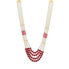 Stunning long necklace set with white and red pearls, adding elegance and vibrancy.
