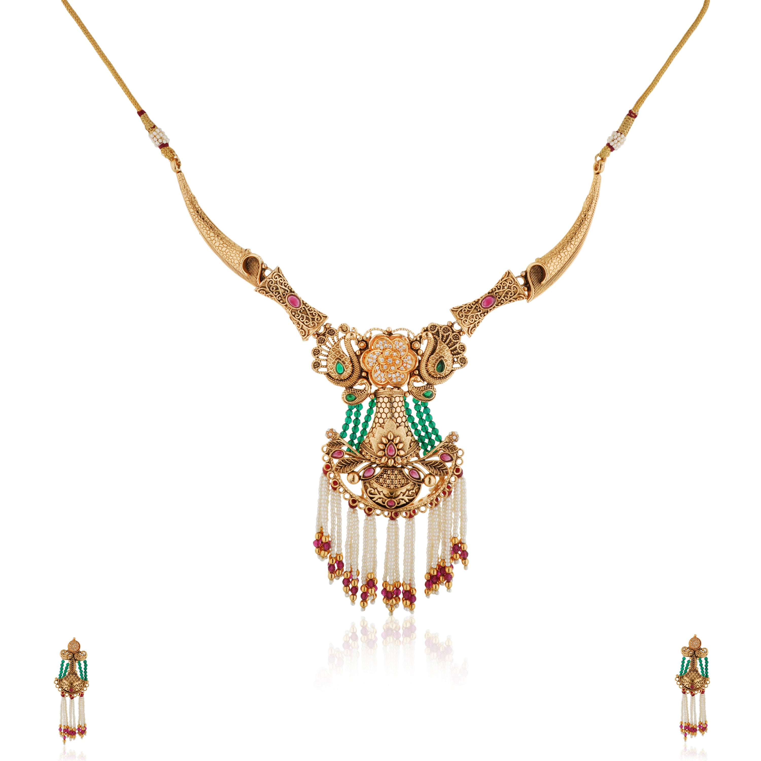 Graceful gold-tone long necklace adorned with pearls, blending tradition with sophistication.
