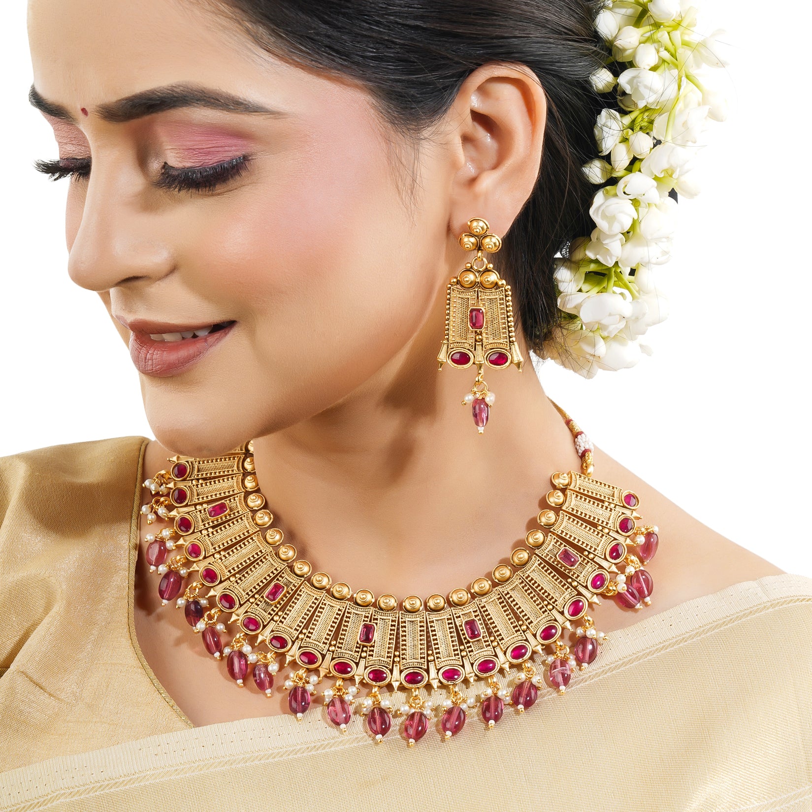 Elegant gold-tone choker necklace set with matching earrings, perfect for festive occasions
