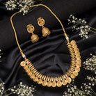 Goddess Laxmi long necklace set with temple design and matching earrings for festive elegance.
