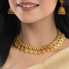 Goddess Laxmi long necklace set with temple design and matching earrings for festive elegance.
