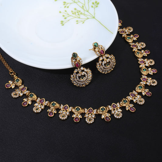 MULTICOLOR STONES-STUDDED GOLDTONE NECKLACE SET AND MATCHING EARRINGS ADORNED WITH VIBRANT STONES SET IN A GOLDTONE FINISH.