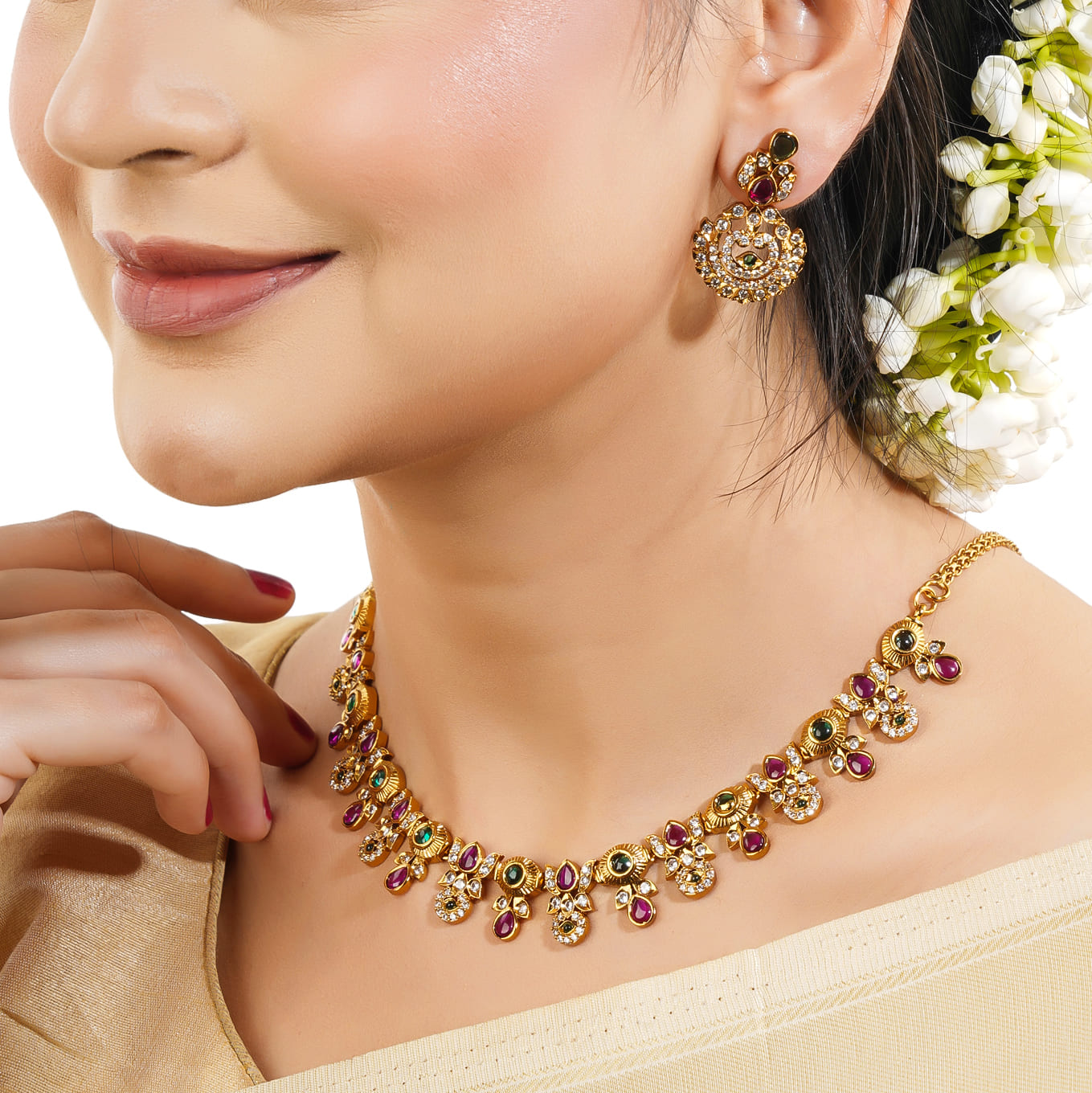 MULTICOLOR STONES-STUDDED GOLDTONE NECKLACE SET AND MATCHING EARRINGS ADORNED WITH VIBRANT STONES SET IN A GOLDTONE FINISH.