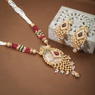 Elegant gold-tone long necklace set with multicolored stones and pearls, perfect for festive occasions.
