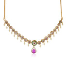 "Elegant gold-tone short necklace set with pink and white zircon stones for a sophisticated touch."
