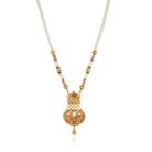 Elegant gold-tone long necklace set with white pearls, offering a classic and refined style."
