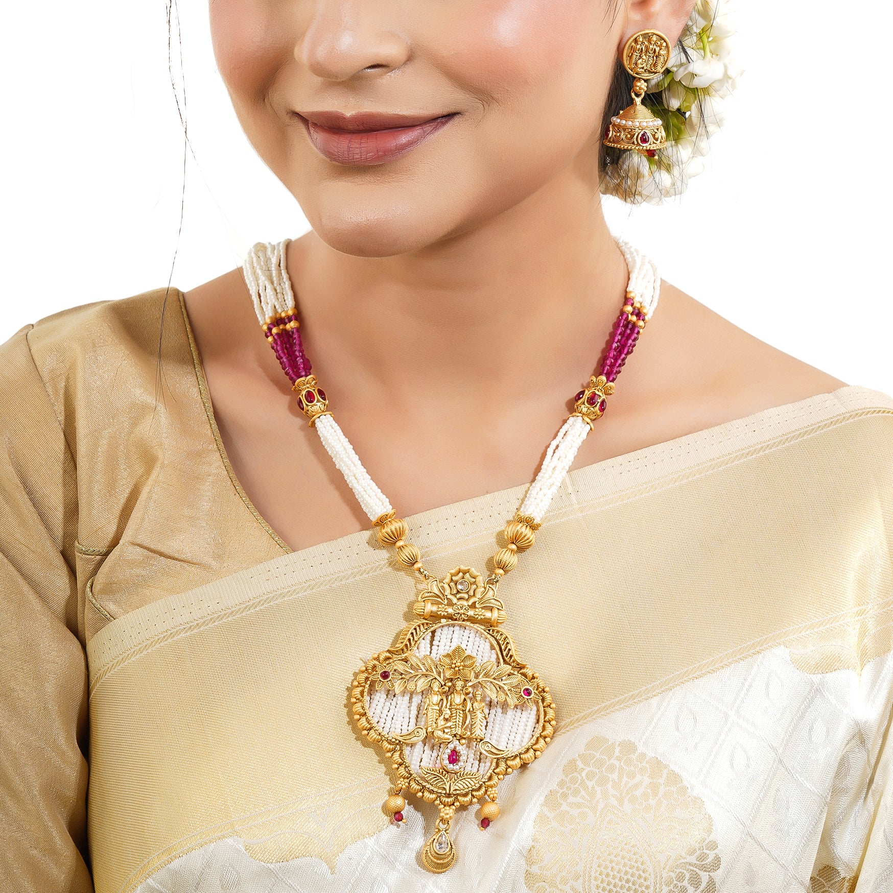 "Golden long necklace set with Ram, Laxman, and Sita design, accented with white and pink pearls."
