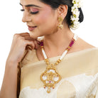 "Golden long necklace set with Ram, Laxman, and Sita design, accented with white and pink pearls."
