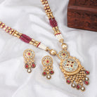 "Beautifully crafted long gold-tone necklace set with intricate Meenakari design, perfect for festivals."
