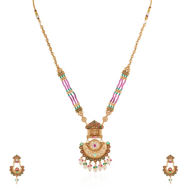 STUNNING LONG GOLD-TONE NECKLACE SET STUDDED WITH MULTICOLORED STONES, OFFERING A BOLD AND VIBRANT ACCESSORY