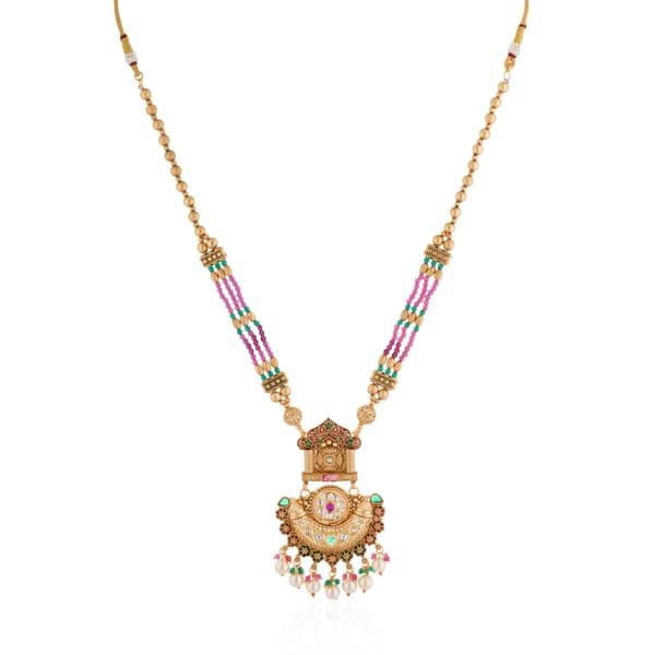 STUNNING LONG GOLD-TONE NECKLACE SET STUDDED WITH MULTICOLORED STONES, OFFERING A BOLD AND VIBRANT ACCESSORY