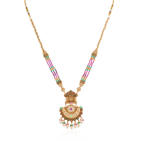 Stunning long gold-tone necklace set studded with multicolored stones, adding bold vibrance."
