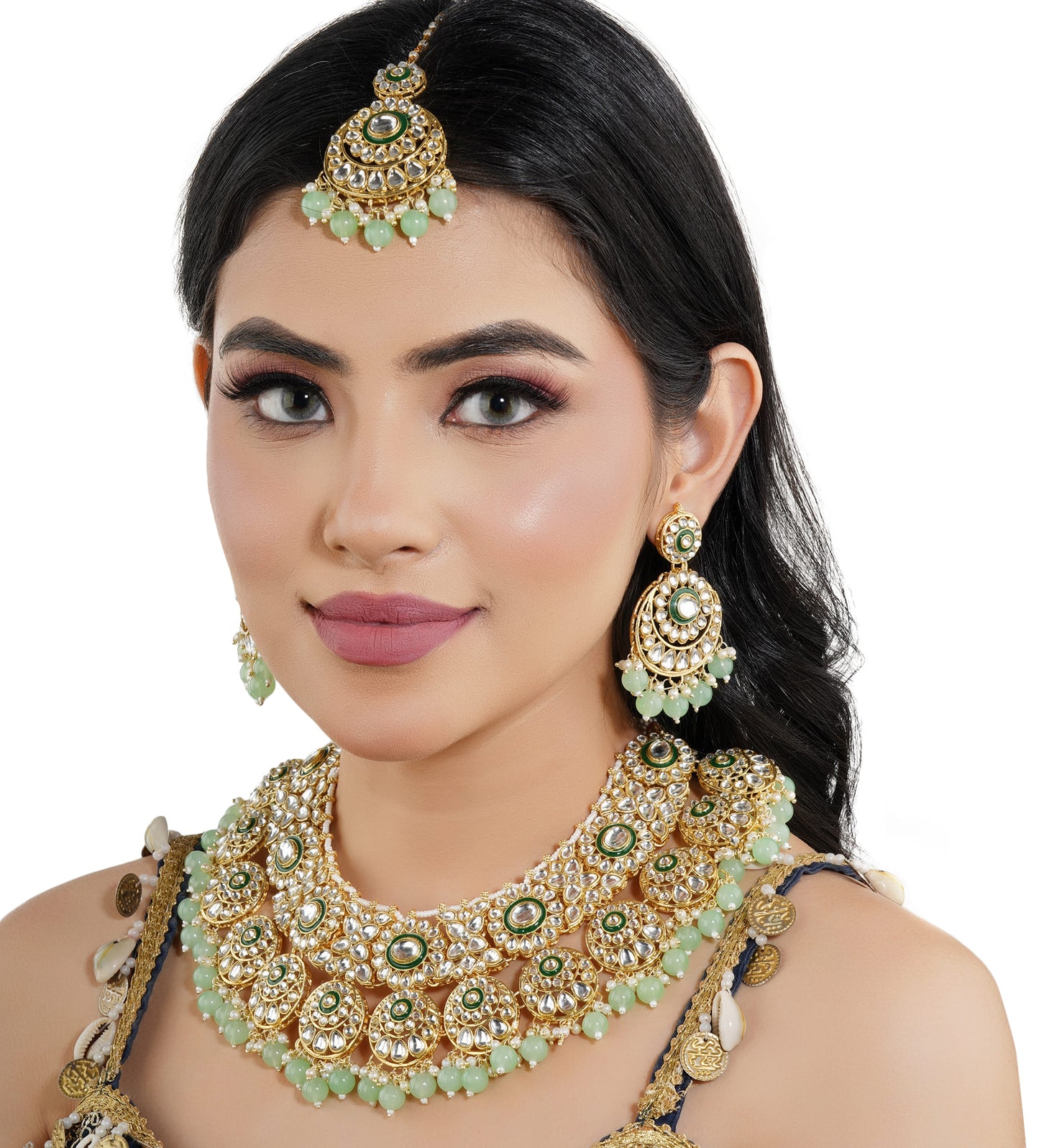 CA02CO04874GREEN-COLORED PEARLS-STUDDED BRIDAL SET INCLUDES A KUNDAN NECKLACE, MAANG TIKA, AND MATCHING EARRINGS.  THIS SET ADDS A REGAL AND ELEGANT TOUCH TO BRIDAL ATTIRE.