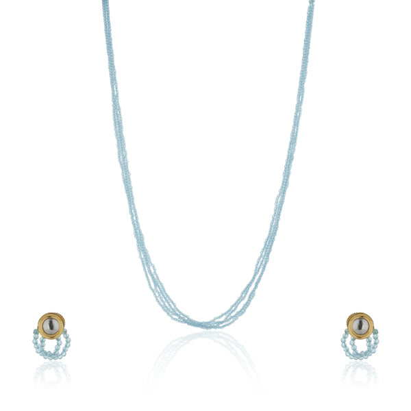 Delicate gold-tone necklace with small blue pearls, offering a subtle and elegant festive charm.
