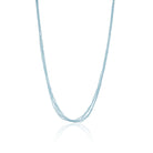 Delicate gold-tone necklace with small blue pearls, offering a subtle and elegant festive charm.
