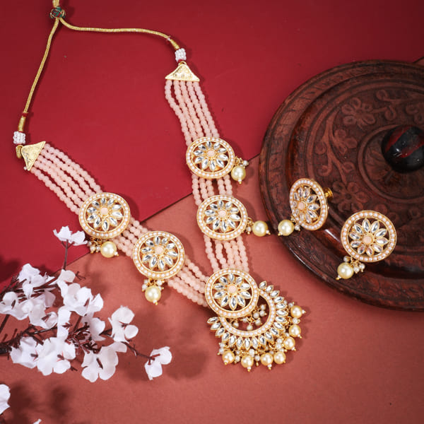 SALMON-COLORED SMALL BEADS-STUDDED KUNDAN NECKLACE SET WITH MATCHING EARRINGS