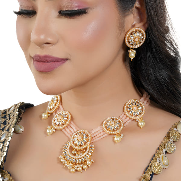 SALMON-COLORED SMALL BEADS-STUDDED KUNDAN NECKLACE SET WITH MATCHING EARRINGS