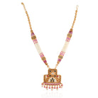 "Elegant gold-tone long necklace set with white pearls, adding a refined and classic festive touch."
