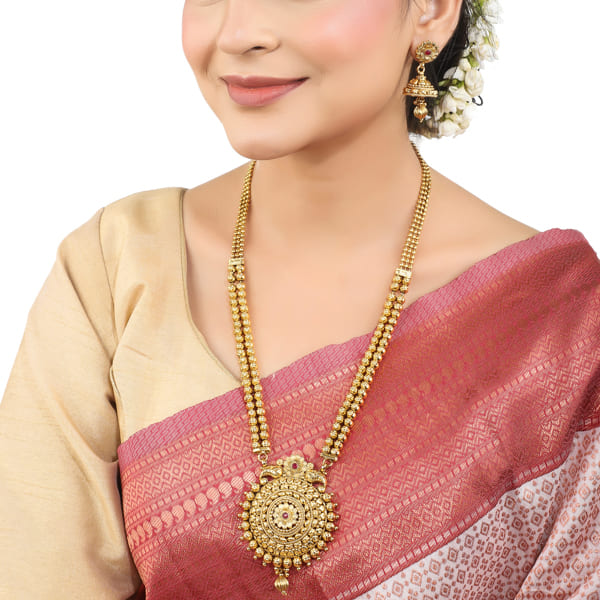 CLASSIC GOLD-TONE LONG NECKLACE SET PAIRED WITH MATCHING GOLD-TONE EARRINGS,