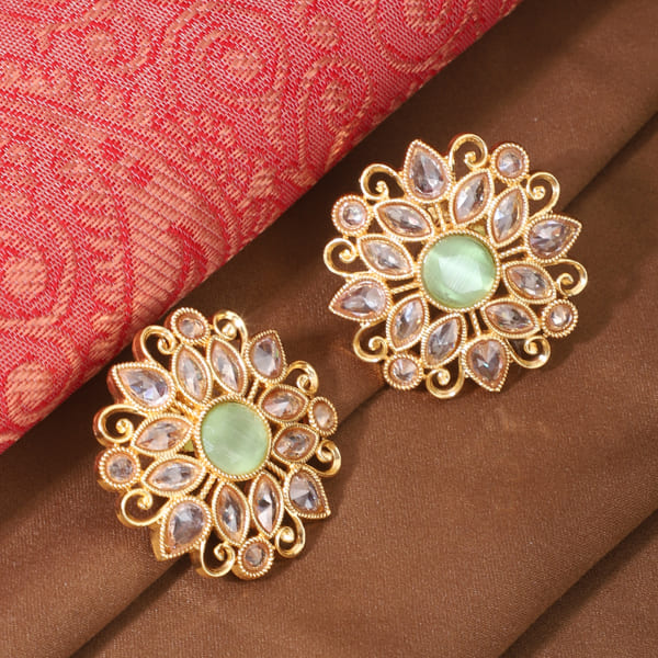 KUNDAN-STUDDED EARRINGS FEATURE INTRICATE DESIGNS WITH TRADITIONAL KUNDAN STONES