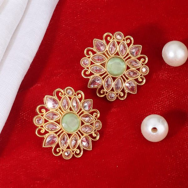 KUNDAN-STUDDED EARRINGS FEATURE INTRICATE DESIGNS WITH TRADITIONAL KUNDAN STONES