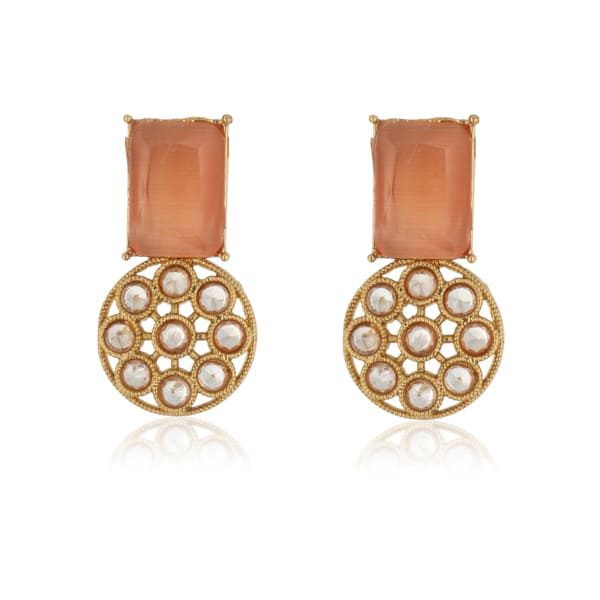 SALMON-COLORED STONES-STUDDED KUNDAN STUDS FEATURE  INTRICATE KUNDAN WORK.