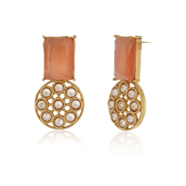 SALMON-COLORED STONES-STUDDED KUNDAN STUDS FEATURE  INTRICATE KUNDAN WORK.