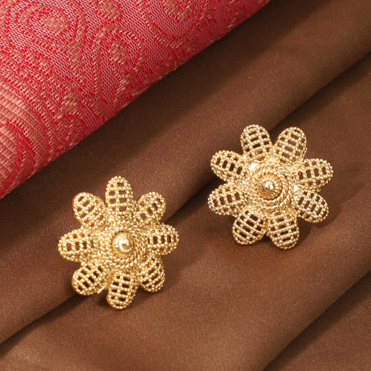 FLORAL DESIGN GOLDTONE EARRINGS FEATURE A GOLDEN FINISH WITH INTRICATE FLORAL PATTERNS.