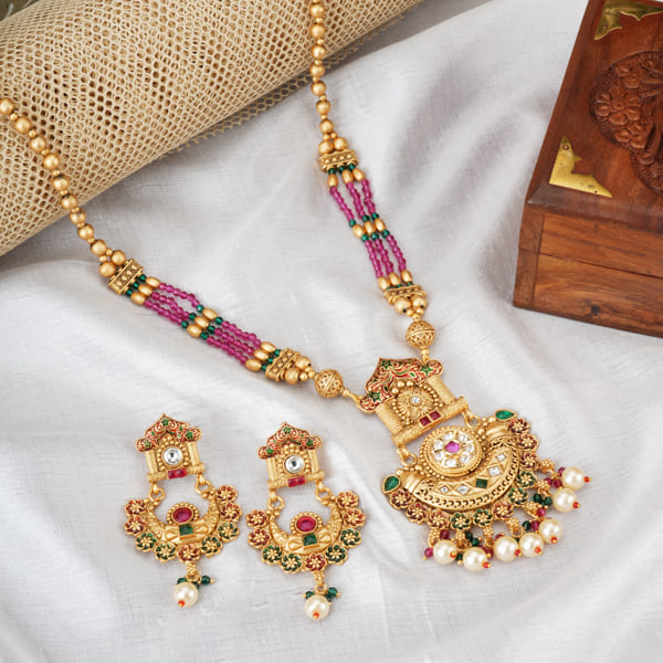 GOLDTONE LONG NECKLACE SET WITH MATCHING EARRINGS FEATURES A  RICH GOLDEN FINISH