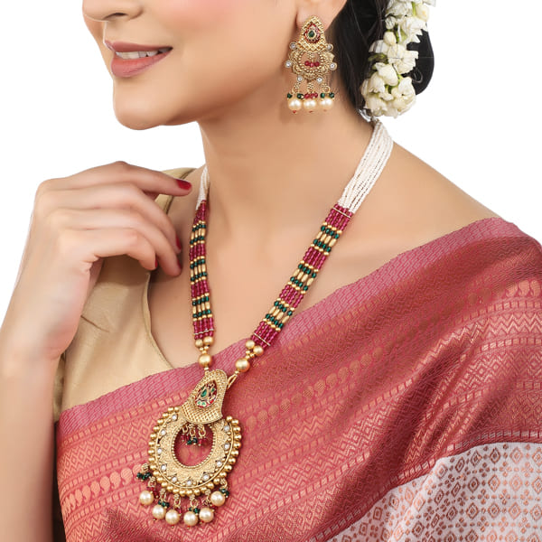 CLASSIC GOLD-TONE LONG NECKLACE SET PAIRED WITH MATCHING GOLD-TONE EARRINGS,