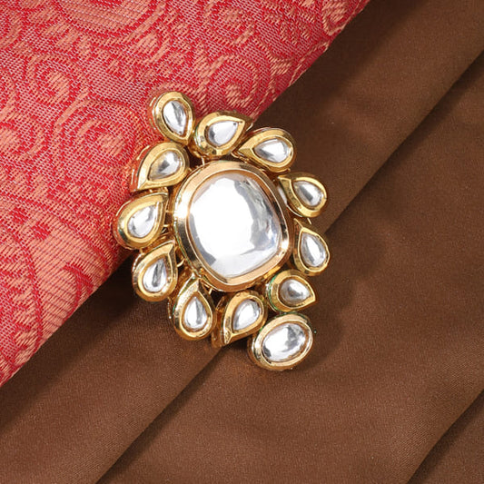 KUNDAN-STUDDED FINGER RING FEATURES INTRICATE KUNDAN STONES SET IN A DETAILED DESIGN.