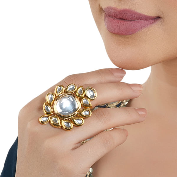 KUNDAN-STUDDED FINGER RING FEATURES INTRICATE KUNDAN STONES SET IN A DETAILED DESIGN.