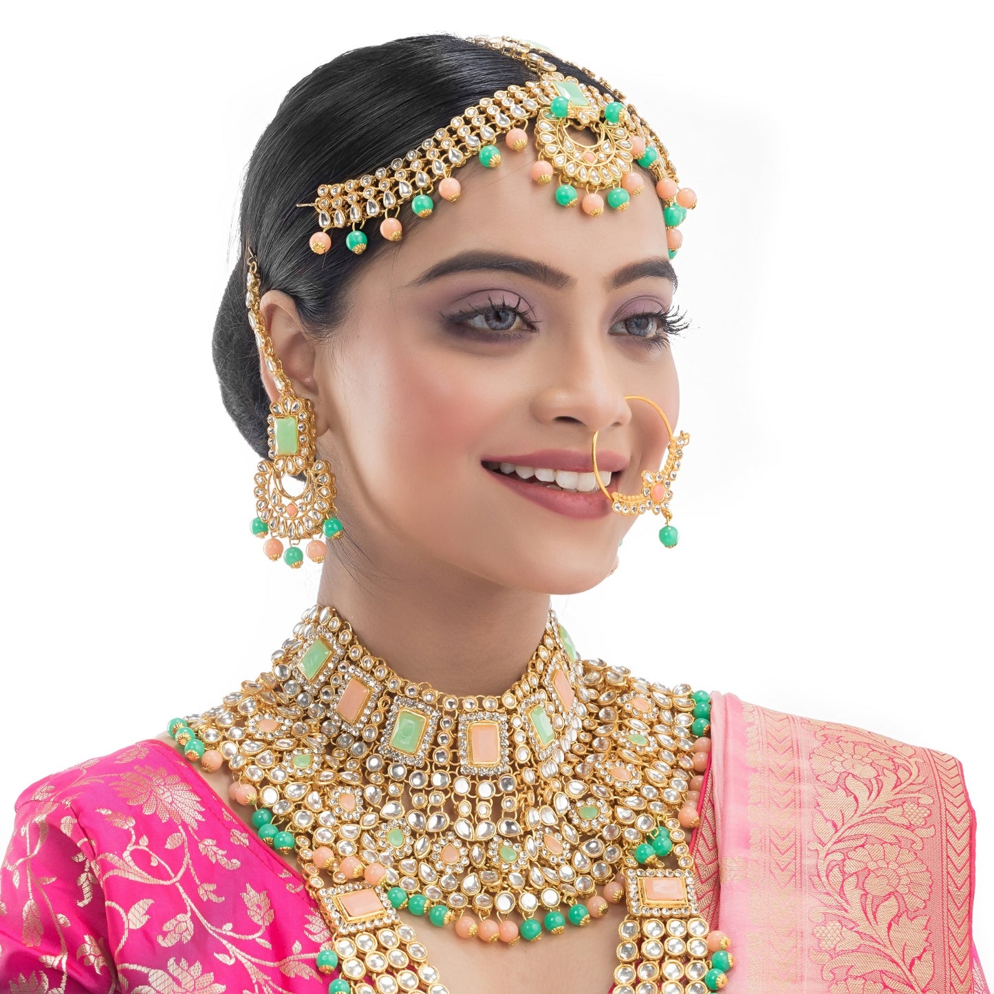 OOPULENT BRIDAL SET FEATURING KUNDAN AND MULTICOLORED PEARLS, INCLUDING EARRINGS, CHOKER, LONG NECKLACE, MAANG TIKKA, AND FINGER RING