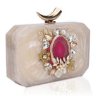  Resin-embellished clutch featuring a pink agate stone, paired with a stylish sling chain.
