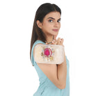  Resin-embellished clutch featuring a pink agate stone, paired with a stylish sling chain.
