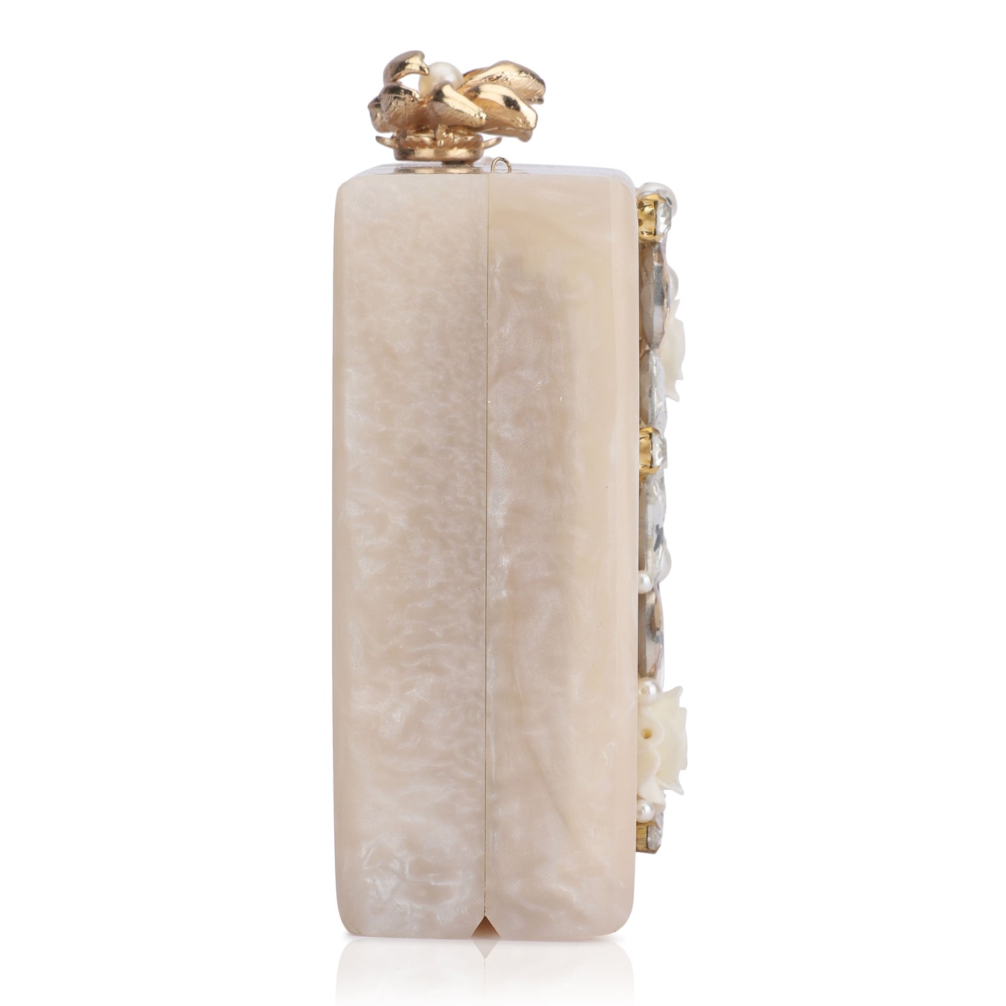 THIS HEAVILY EMBELLISHED CLUTCH, DESIGNED WITH AN EXTRA POCKET FOR ADDED CONVENIENCE AND A STURDY SLING THAT COMPLEMENTS ITS CHIC SLING KNOB.