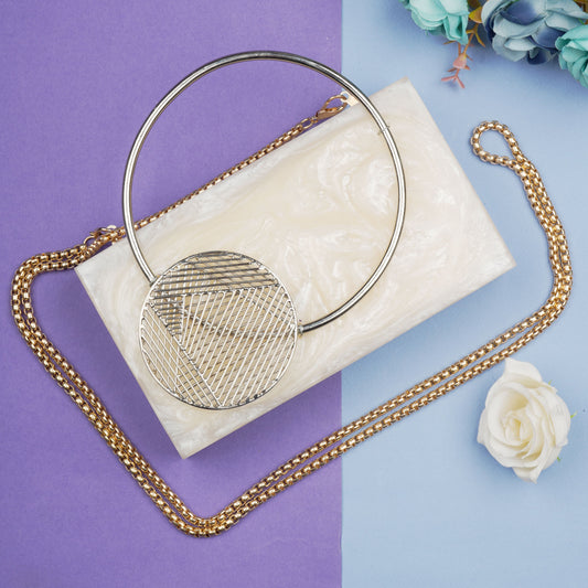 THIS CLUTCH FEATURING HEAVY STONE EMBELLISHMENTS, SOFT ELASTIC LINING, AND AN EXTRA POCKET FOR PRACTICAL STORAGE.