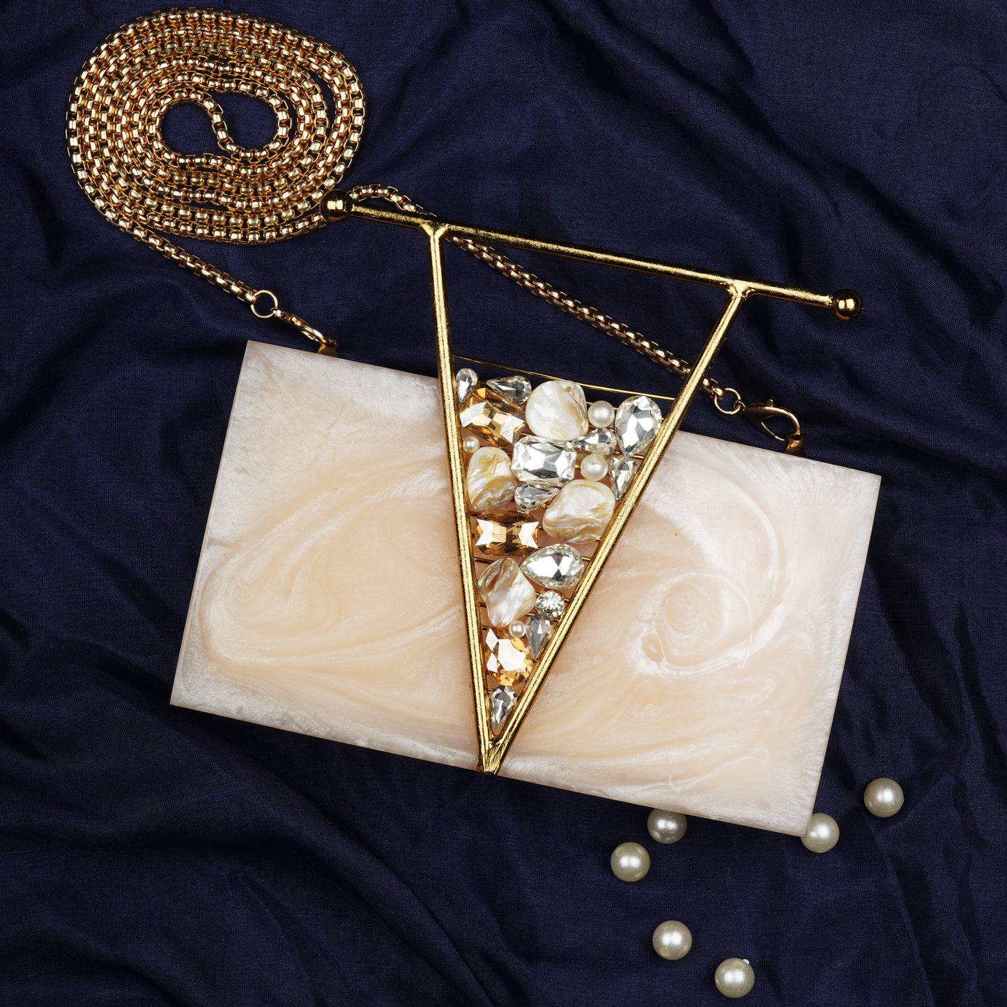 SHOWCASE YOUR STYLE WITH THIS BEAUTIFULLY CRAFTED RESIN CLUTCH, DESIGNED TO PERFECTION WITH EXQUISITE DETAILS.