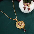 Gold-tone chain pendant necklace set with multicolored stones, offering a dynamic and stylish flair
